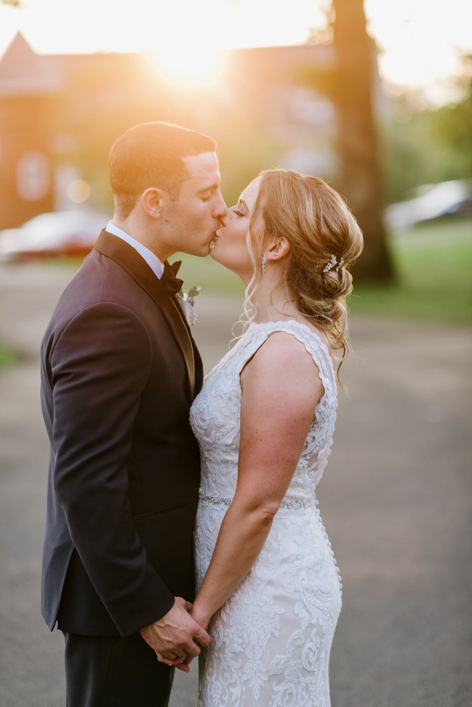 Bride and groom kiss