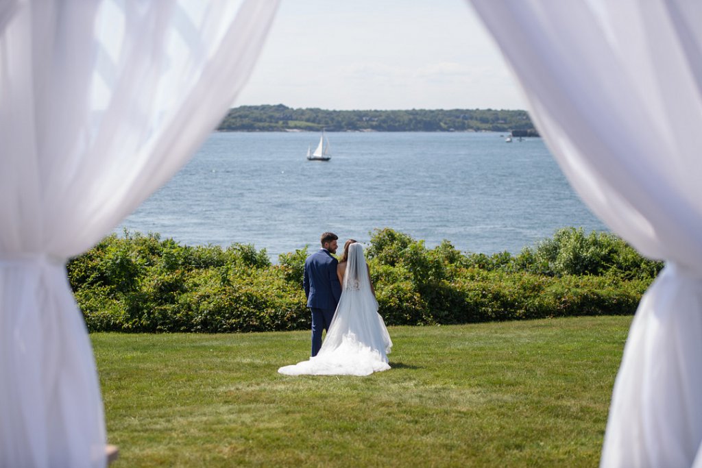 Bride and groom near the lake