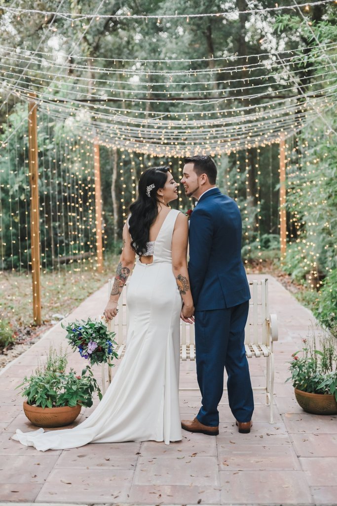 Strand lights over bride and groom