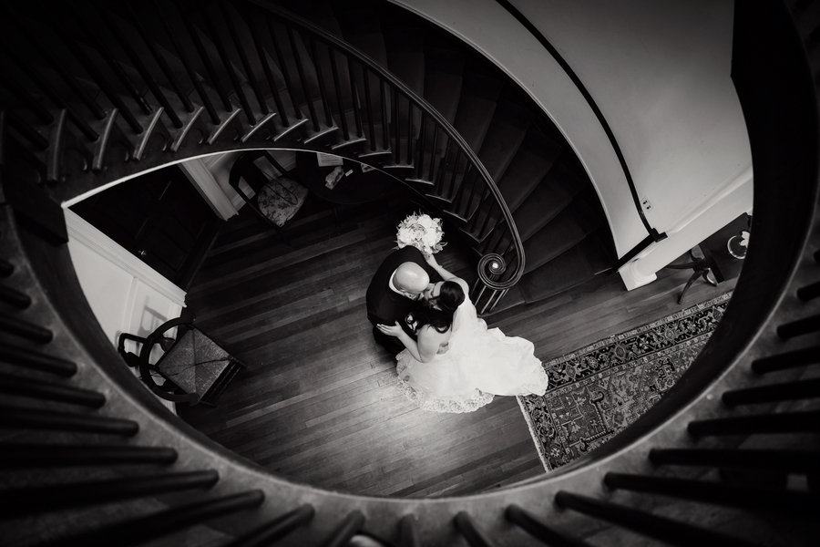 bride and groom stairs