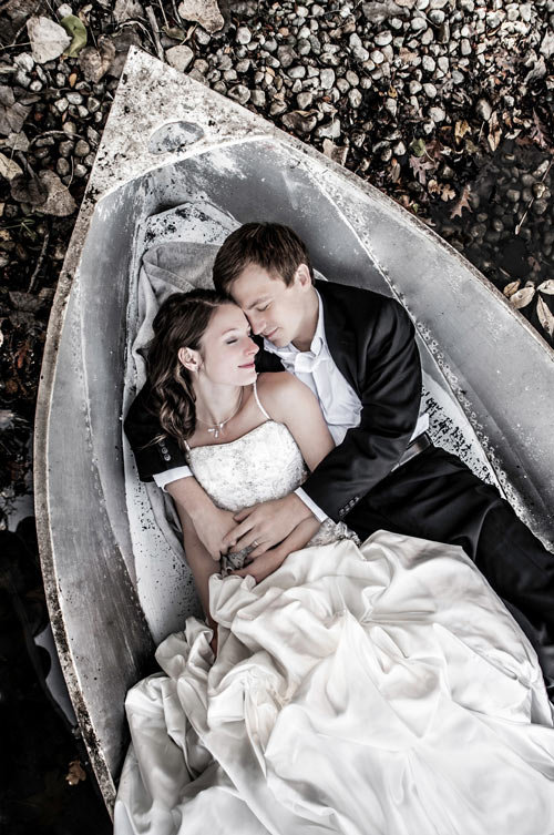 bride and groom in a boat