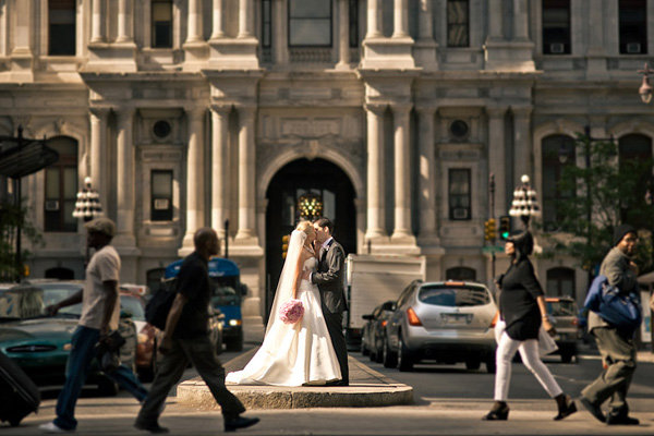 bride and groom in city