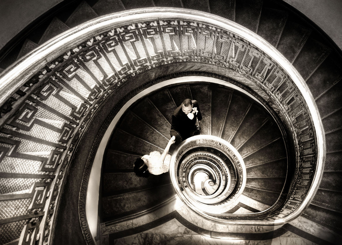 bride and groom on stairs