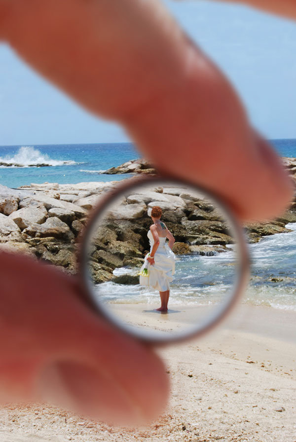 bride through the grooms wedding ring