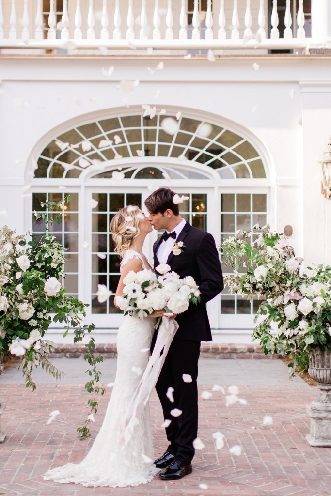 Bride and groom kissing