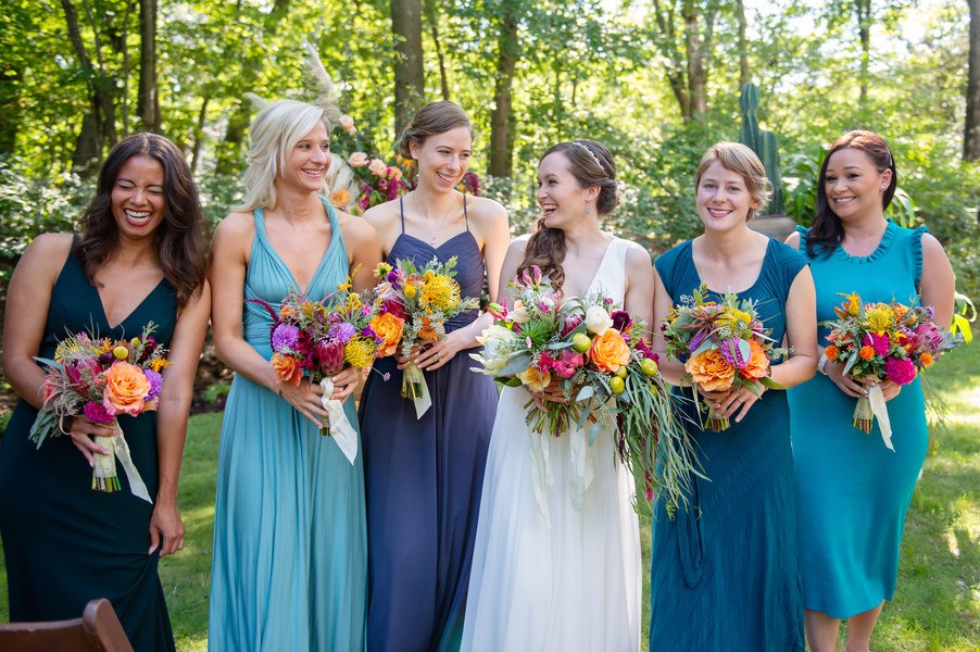 Mix and match bridesmaids with contrasting bouquets