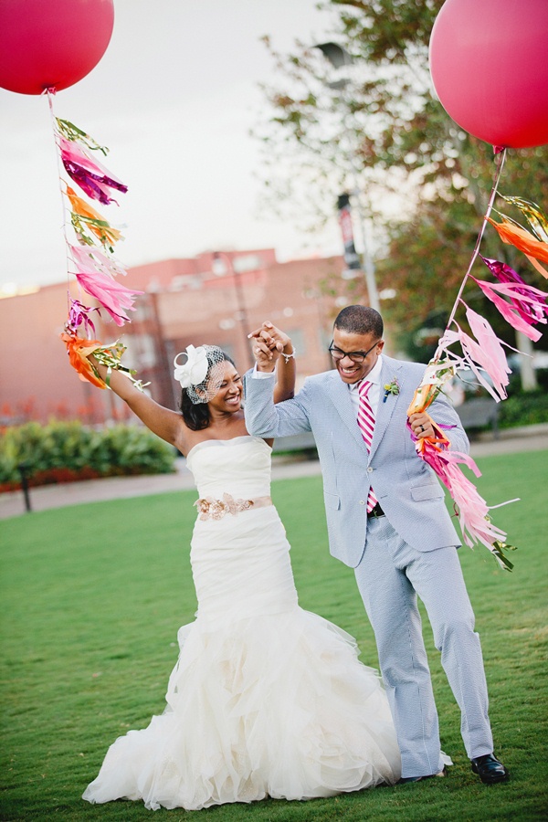 couple with bright balloons