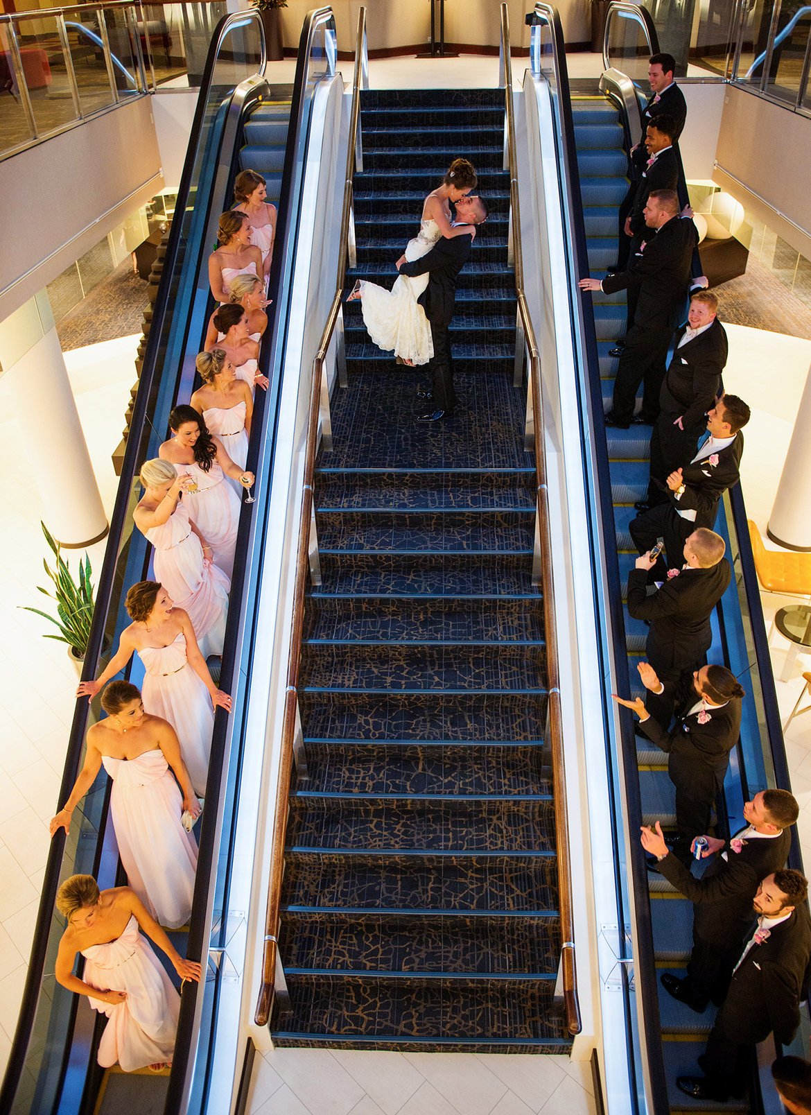 elevator wedding photo with bridal party