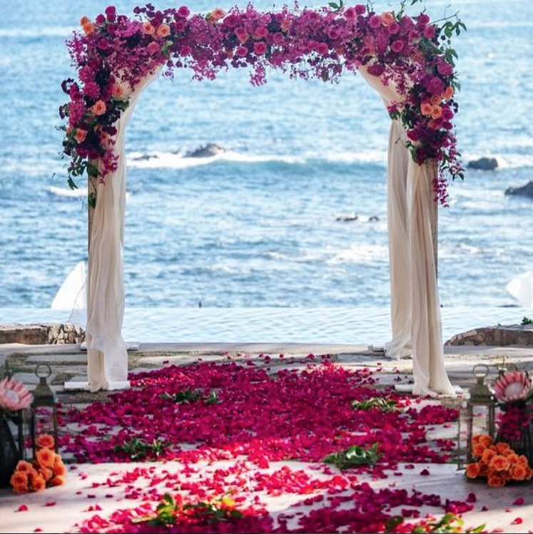 flower arch by the sea