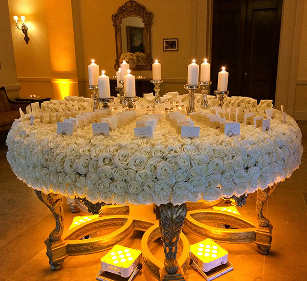 flower covered escort card table