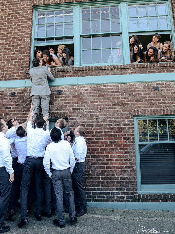 groom taking a peek at his bride