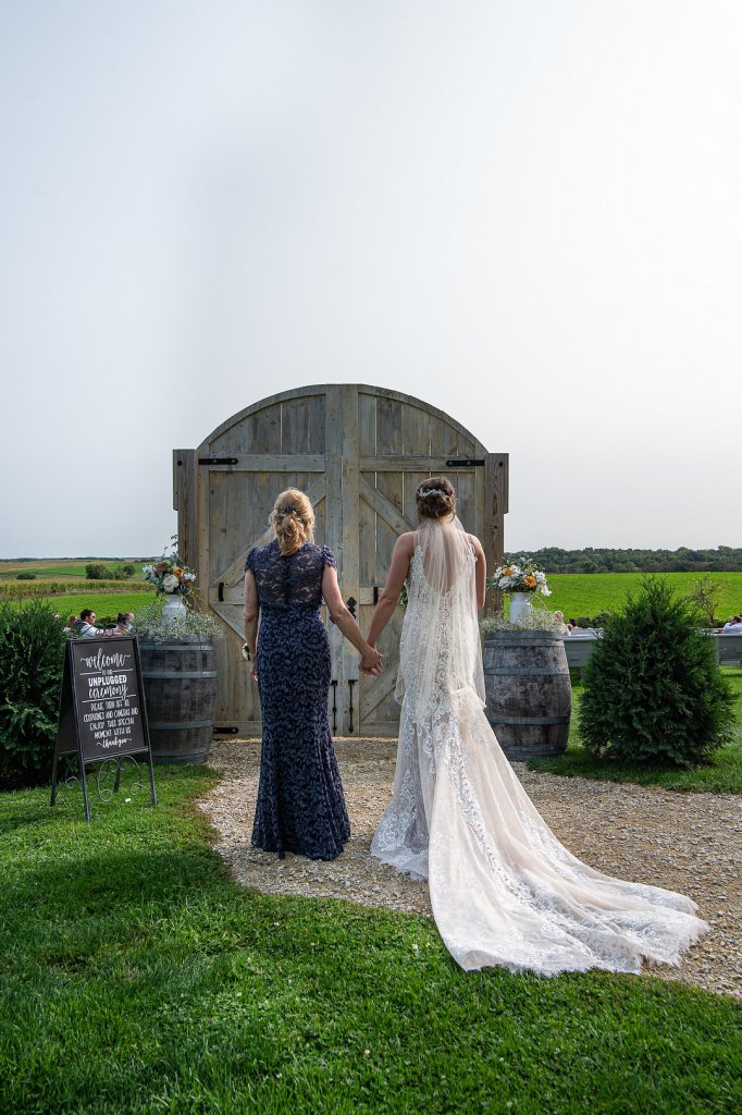 bride with mom before walking down aisle