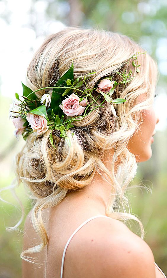 loose waves chignon with flowers