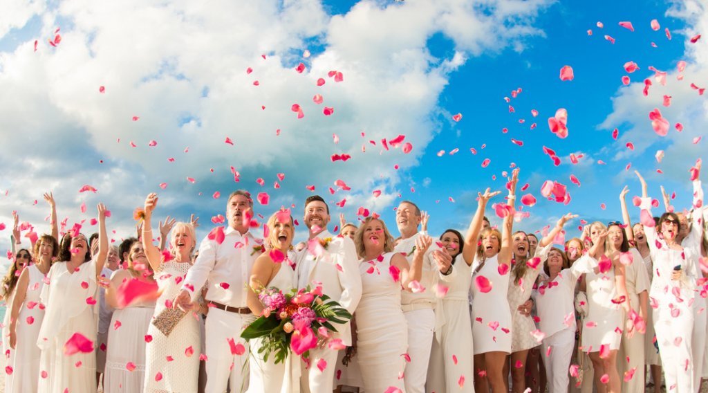 flower petal toss at beach wedding