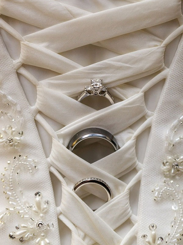 wedding rings in gown