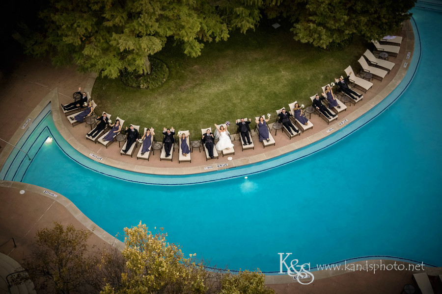 Wedding party relaxing by the pool