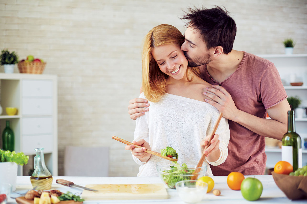 man and wife cooking