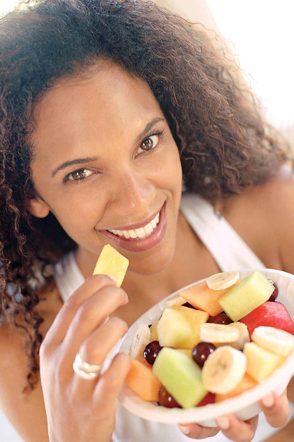 woman eating fruit