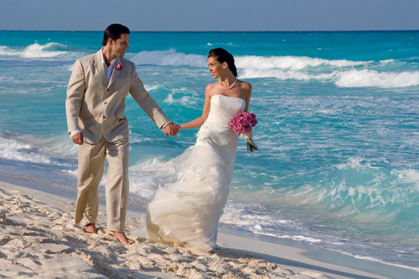 bride and groom on the beach 