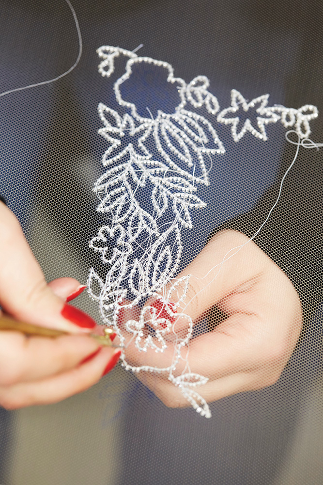 Hand beaded wedding gown