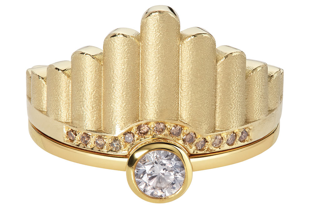 stacked gold band on solitaire engagement ring flora bhattachary
