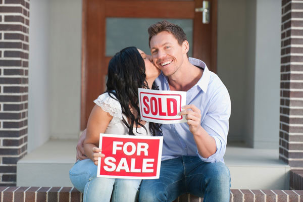 couple buying a house