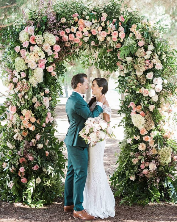 lush floral wedding ceremony arch