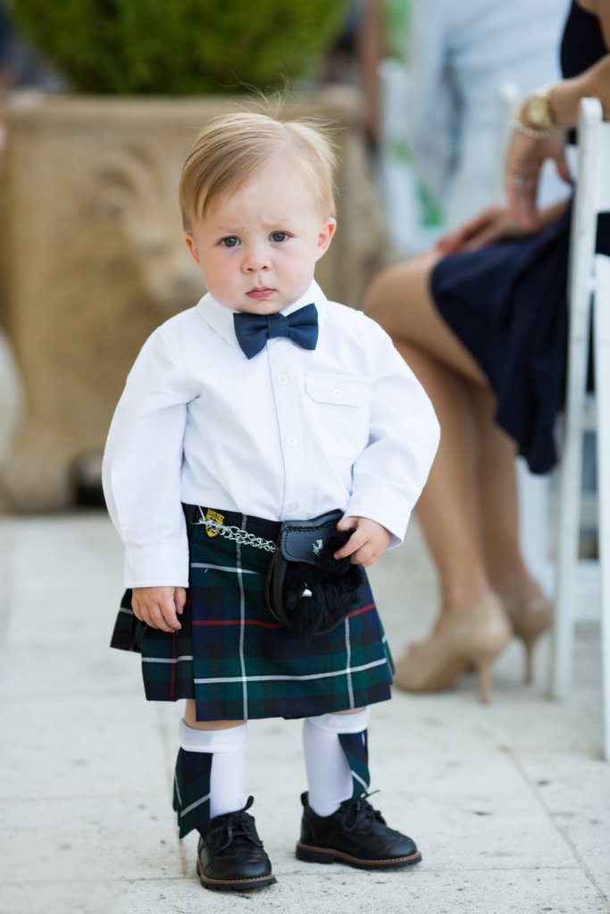 ring bearer in a kilt for an irish wedding