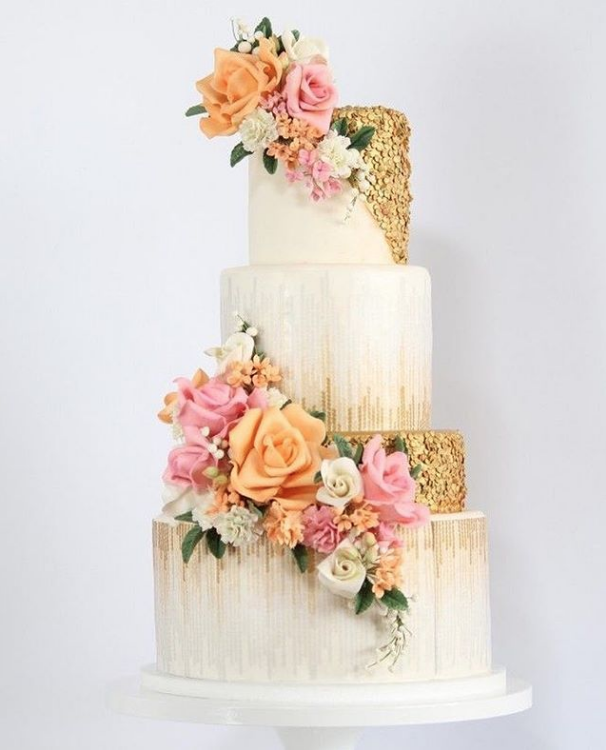 warm hued sequin and flower wedding cake