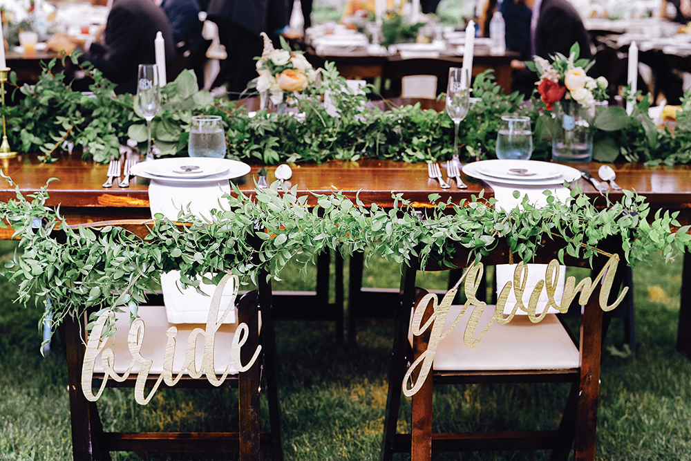 bride and groom wedding chair signs