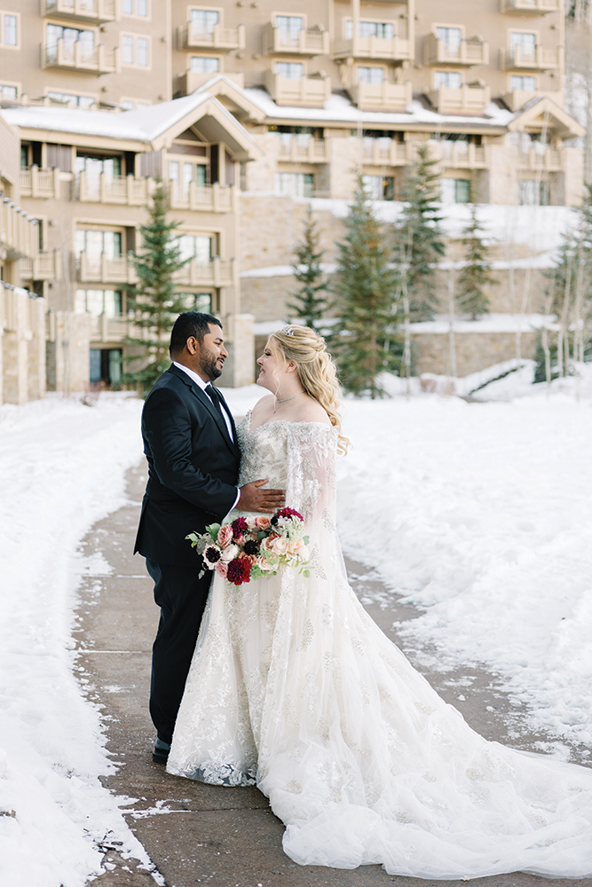 bride and groom kiss