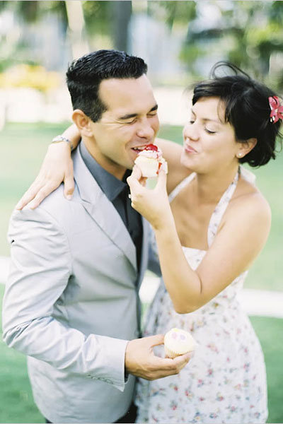 groom eating cake