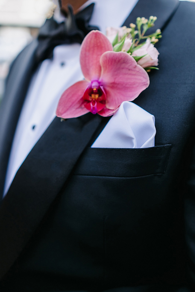 colorful groom boutonniere