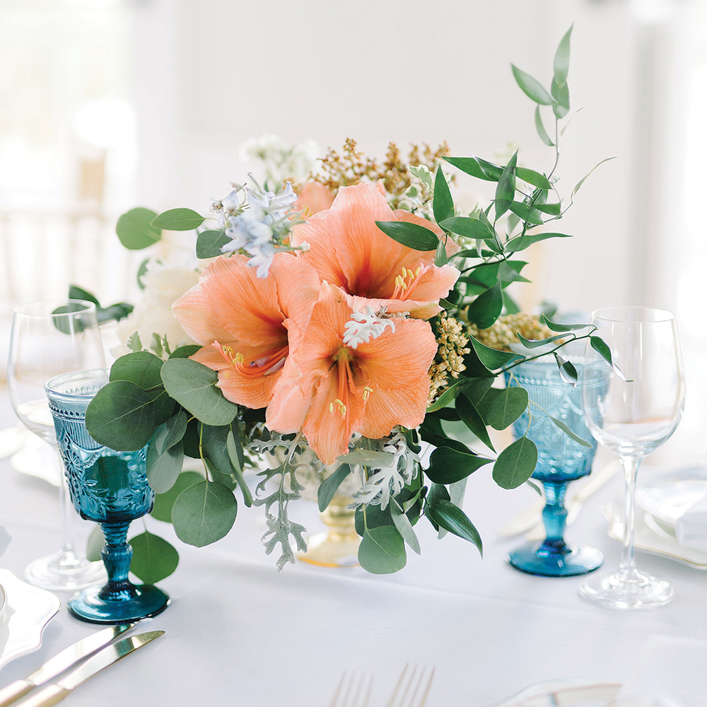 Orange and blue wedding centerpiece