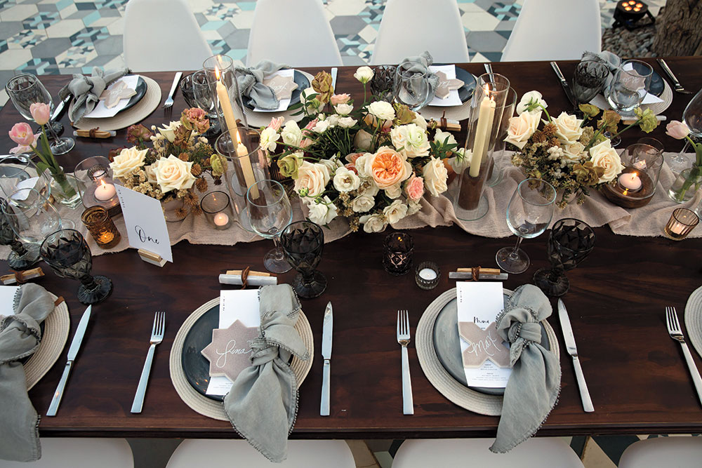 Modern art wedding reception place setting