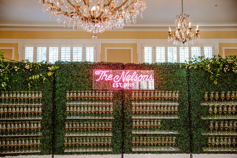 Champagne wedding escort card display