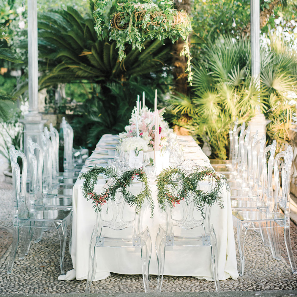 Wedding reception with ghost chairs