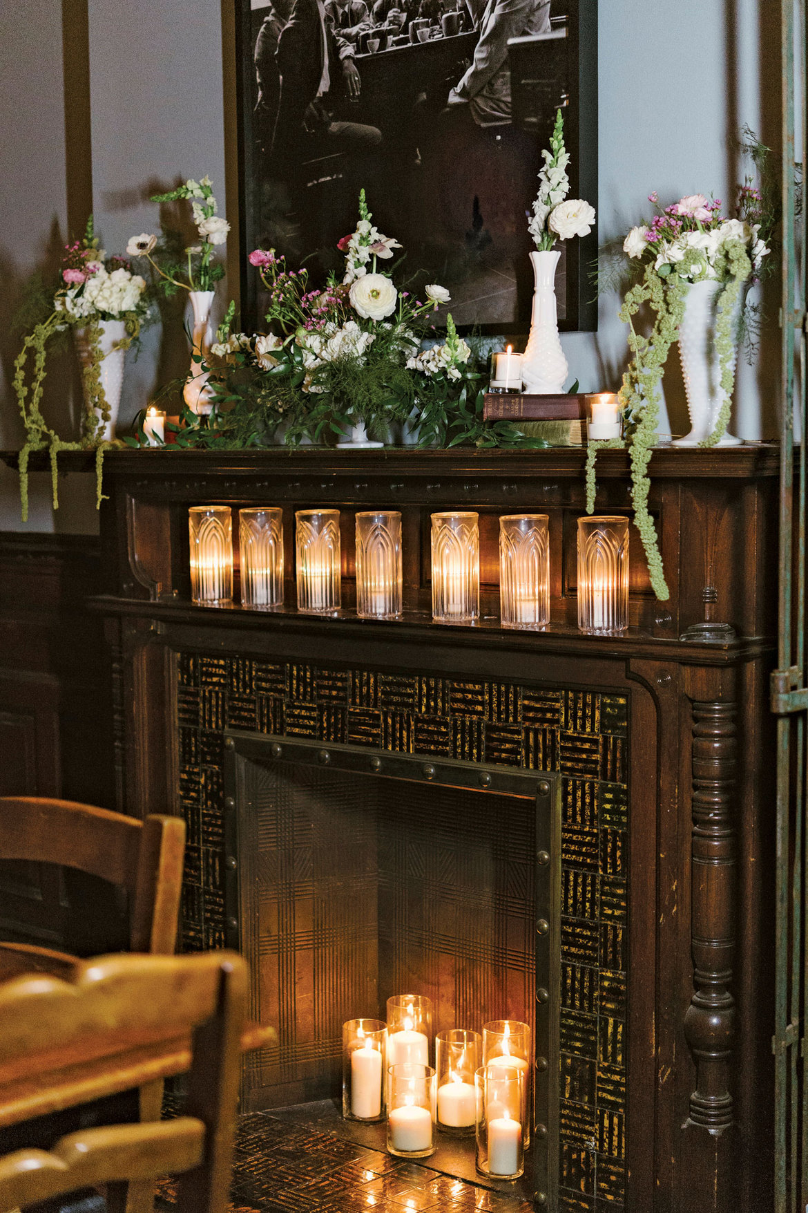 fireplace filled with candles