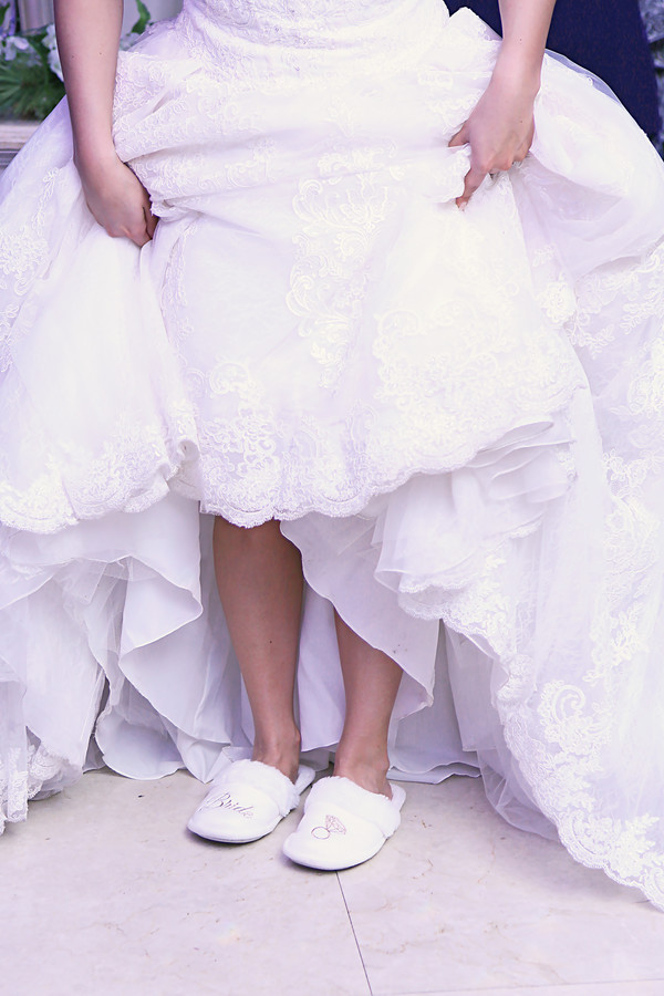 Bride wearing slippers