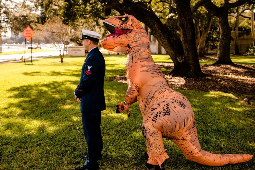 Dinosaur costume during wedding first look