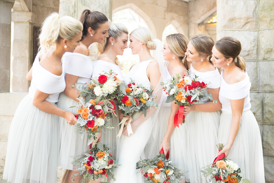 bride and bridesmaids with bouquets