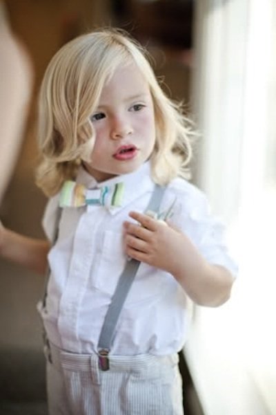 ring bearer wearing a bow tie 