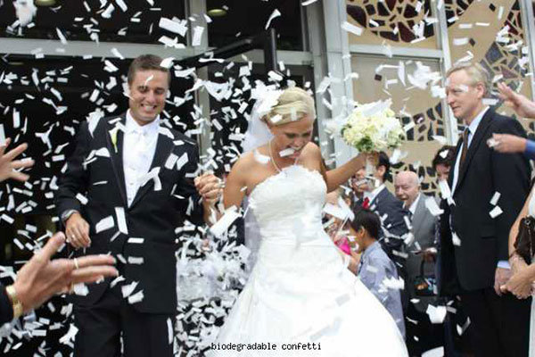 bride and groom with confetti