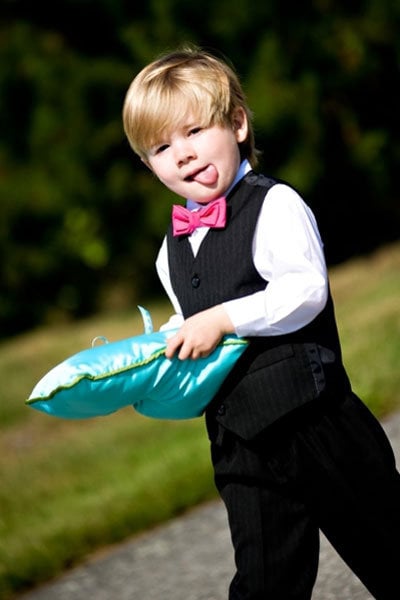 ring bearer holding a classic pillow