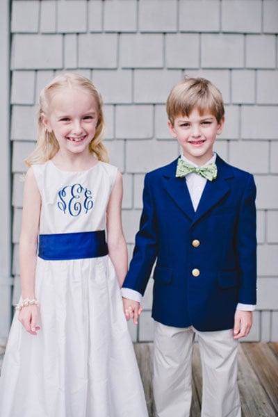 ring bearer holding hands with flower girl