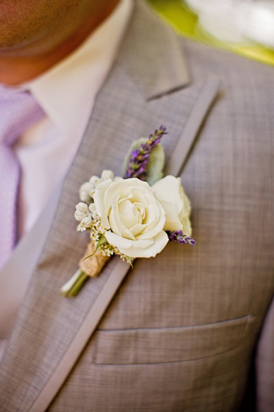 purple boutonnier wedding flowers orchid