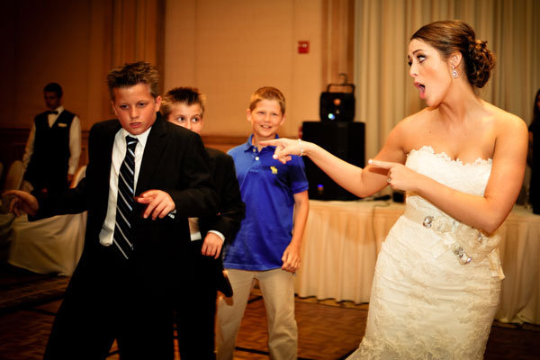 bride and guests dancing