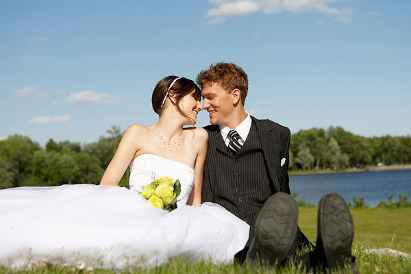 bride and groom about to kiss 