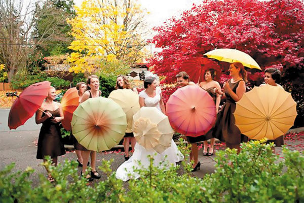 bridesmaids with umbrellas