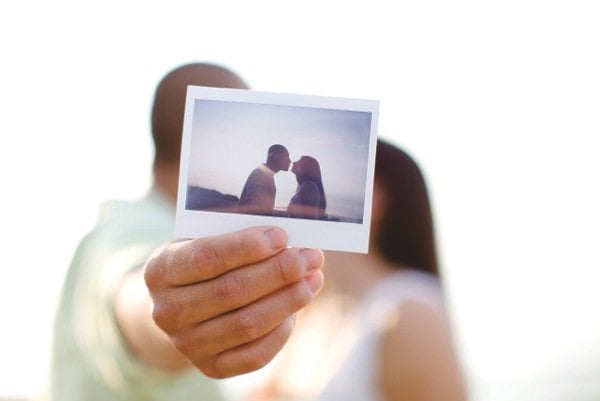 couple with wedding photo